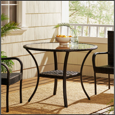 Table d'extérieur durable et élégante en résine pour patio et jardin, parfaite pour accueillir et se détendre