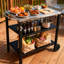 Chariot de barbecue extérieur à 3 niveaux avec plateau en acier inoxydable, table de préparation mobile sur roulettes, barre de service pour le patio et la cour arrière, support de four à pizza noir, rouille, rangement spacieux, mobilité facile, facilité de déplacement