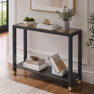 Cette console étroite à double couche noire et dorée en verre trempé de 41,04 pouces est parfaite pour un couloir, un salon, un bureau ou une table d'appoint.