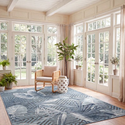 Tapis intérieur / extérieur turquoise / bleu marine Sparks Lianne
