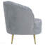 Chaise capitonnée grise et dorée