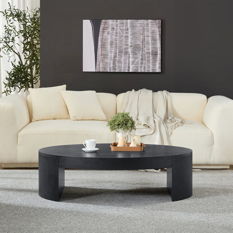 Table basse ovale moderne de luxe avec pieds semi-ronds rainurés en noir