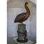 Statue Hooten Pelican sur une souche