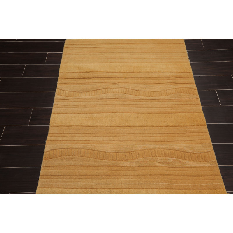 Tapis jaune en laine touffeté