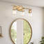 Éclairage pour meuble-lavabo Koos Gold