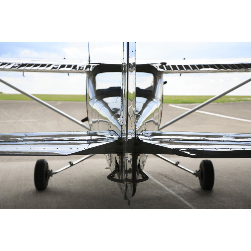 Avion dans un hangar de Bim, H 32 po x l 48 po