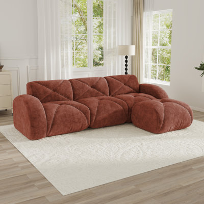 Canapé en forme de L en velours doux désossé, mousse 32D haute densité, base sans assemblage, conception antidérapante, repose-pieds mobile convenant aux salons.