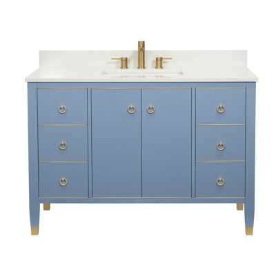 Meuble-lavabo autoportant 48 po en bois massif avec bordure dorée et pieds, 6 tiroirs et 2 portes. Comprend un comptoir en quartz blanc avec dosseret et un lavabo encastré en marbre synthétique blanc avec lavabo rectangulaire, 3 trous (robinet de 8 pou