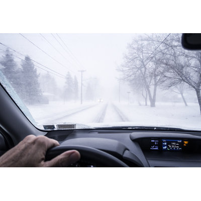 Approaching Blind Road Intersection in Foggy Blizzard Snow Storm by Willowpix