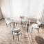 Table de salle à manger de 51,51 po en verre contemporain avec pieds en métal trempé et noir, pouvant accueillir 4 à 6 personnes confortablement pour les repas en famille.-873441865