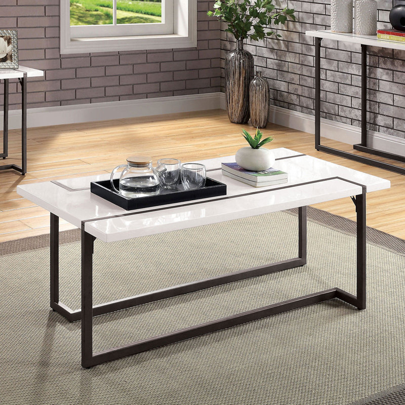 Pieds de table basse de style moderne et contemporain se prolongeant sur le plateau de la table.