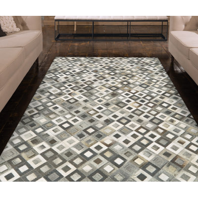 Tapis géométrique en cuir fabriqué à la main gris / beige