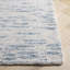 Tapis abstrait touffeté à la main en laine / coton touffeté à la main en ivoire / bleu clair Touete-618701399