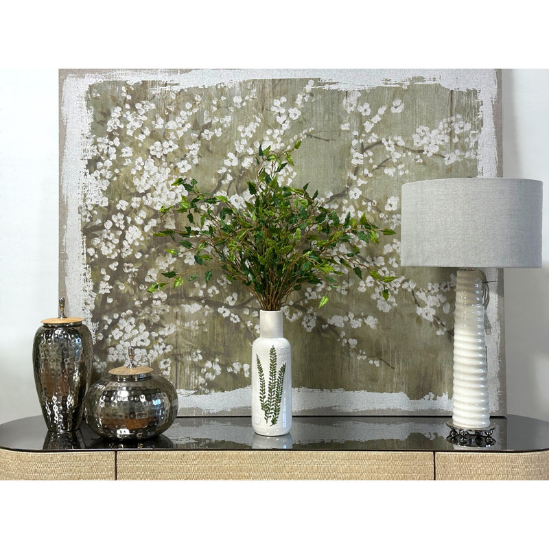 Organic Modern Smilax Arranged in a Ceramic Leaf Vase