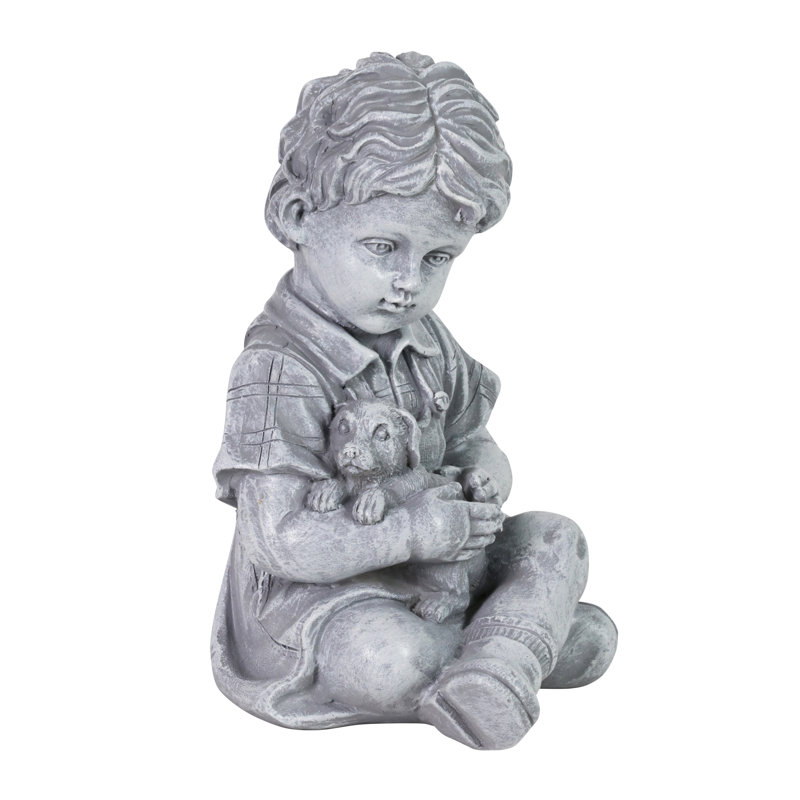 Statue garçon avec chiot