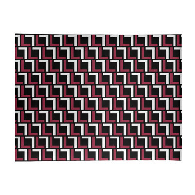 Tapis géométrique rose / noir / blanc