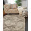 Tapis beige rond à motif floral Levi-441499546
