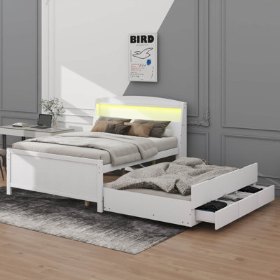Lit plateforme élégant avec rangement et tête de lit à DEL avec lit gigogne et 3 tiroirs