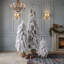 Ensemble de 3 sapins de Noël artificiels pré-illuminés, recouverts de neige floquée et de lumières DEL multicolores.