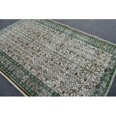 Handmade Turkish Area Rug With Green And White Geometric Patterns For A Vintage Decor Inspiration