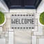 Tapis de porte extérieur à motif de faux carreaux Welcome, par Angela Nickeas, 18 po x 30 po