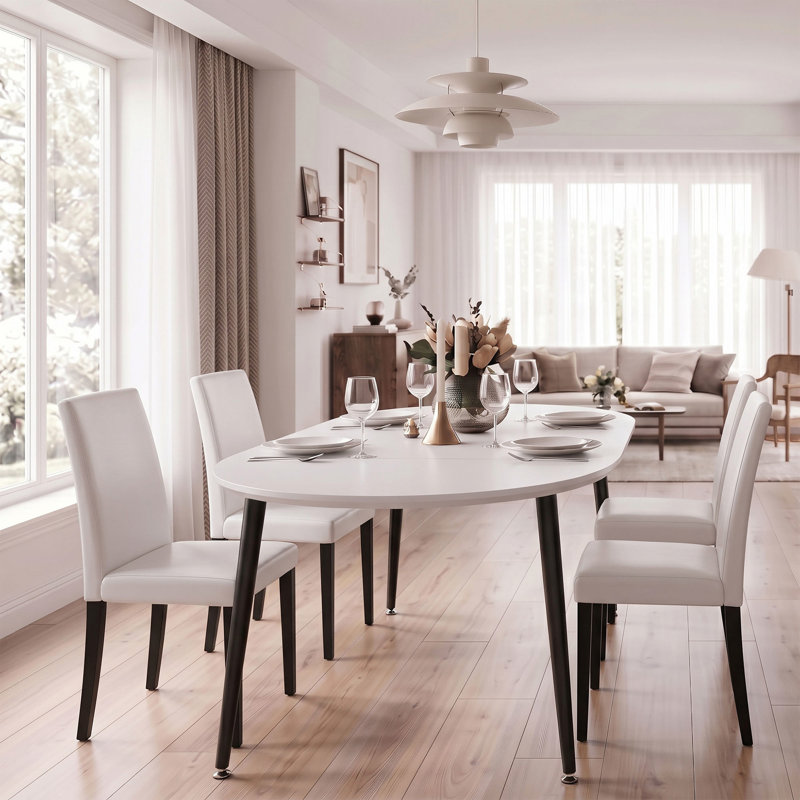 Ensemble de table et de chaises de salle à manger rondes extensibles avec 4 chaises en similicuir, dessus en MDF et structure en métal noir.