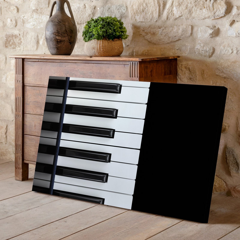 Toile, composition minimaliste et élégante avec art mural d'un clavier de piano posé sur une toile noire unie