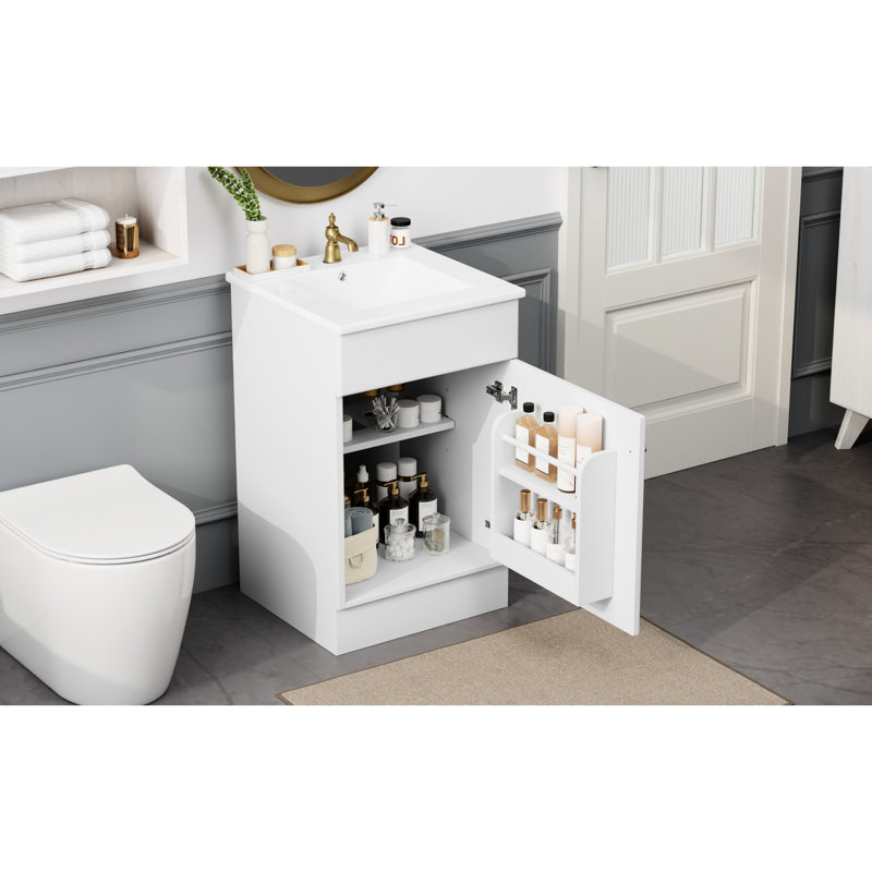 Meuble-lavabo de 20 po avec lavabo en céramique, blanc. Tablette organisateur d'armoire. Lavabo à surface lisse. Porte silencieuse pour blanc et lavabo. Étagère. Surface de l'eau du bassin.