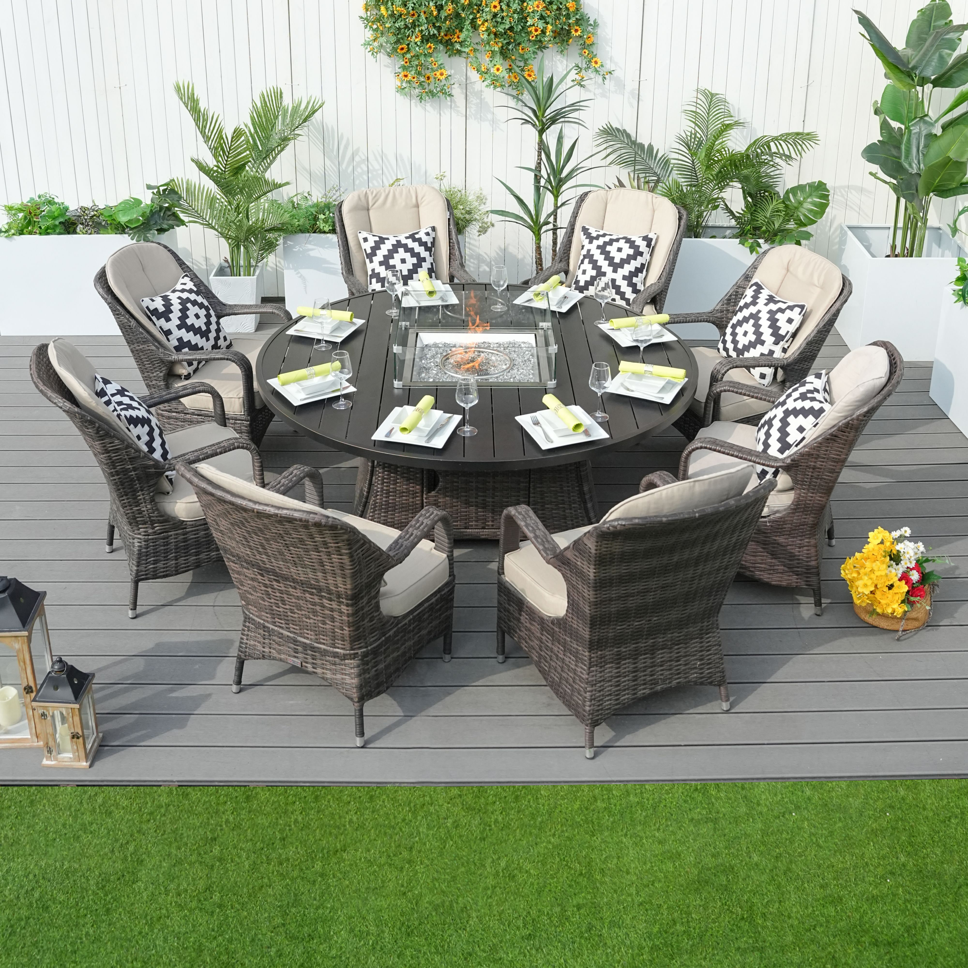 round patio table and chairs with fire pit