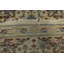 Tapis beige floral en laine noué à la main