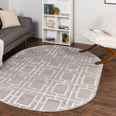 Tapis gris argenté à motif géométrique glam