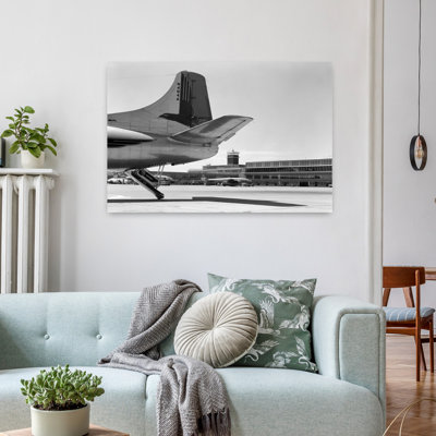 1950s TAIL OF COMMERCIAL AIRPLANE WITH OTHER PLANES AND AIRPORT TERMINAL AND TOWER IN BACKGROUND PHILADELPHIA PA USA 1 Piece Wrapped Canvas Wall Art