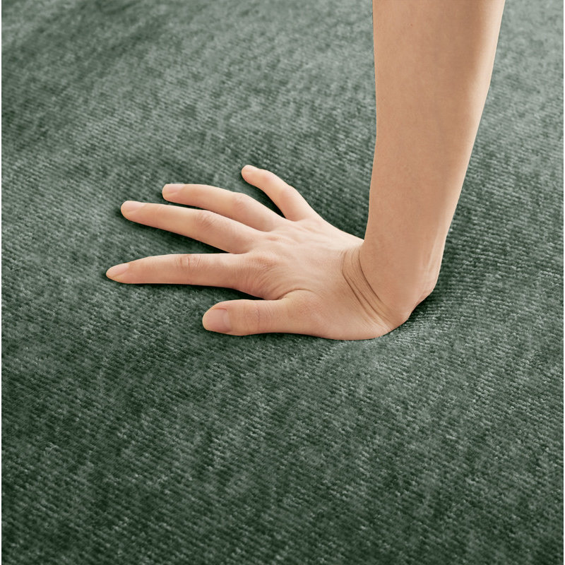 Repose-pieds en velours vert, Vert