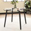 Table en verre trempé transparent 107 x 107 x 75 cm, pattes en métal, idéale pour la cuisine et la salle à manger. Table moderne noire 107 x 107 x 75 cm, convient aux espaces de vie.