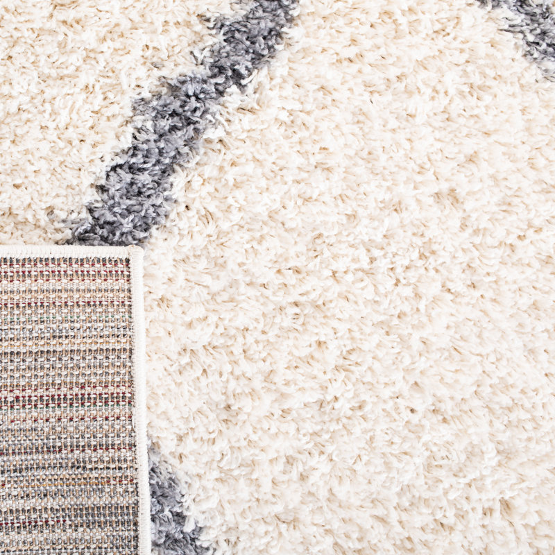 Tapis ivoire à motif géométrique, Rectangle 2 pi 7 po x 5 pi
