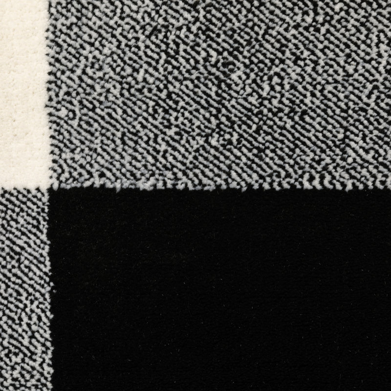 Tapis noir / ivoire Schoffer, Rectangle 6 pi 7 po x 9 pi 2 po