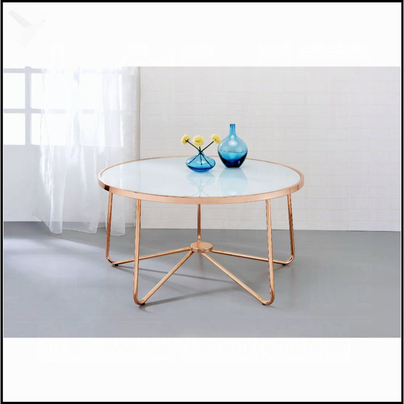 Table basse avec plateau en verre givré et finition rose doré, mobilier de salon moderne et élégant, parfait pour les petits espaces