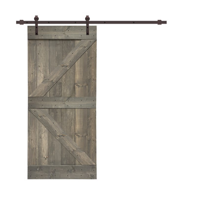 Porte de grange en panneau de bois et métal peint avec ensemble de quincaillerie d’installation