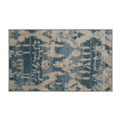 Tapis gris soyeux et moelleux