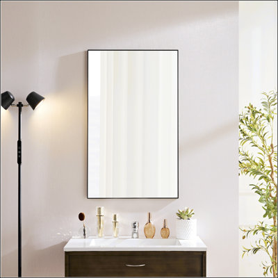 Elegant Bathroom Mirror With Floating Glass And Rust-Resistant Frame, Ideal For Modern And Industrial Decor.