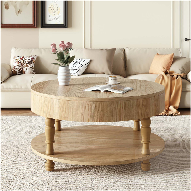 Table basse ronde avec rangement dissimulé et tablette ouverte