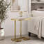 Table d'appoint moderne et glamour en forme de C avec structure en fer durable et plateau en verre trempé, parfaite pour les espaces de vie élégants.