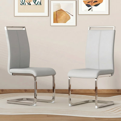 Chaises de salle à manger en faux cuir modernes avec base chromée et poignées en métal (ensemble de 2)