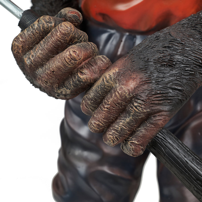 Statue de singe golfer