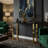 Gracen Narrow Contemporary Glass Console Table in Polished Gold Finish, Black Glass