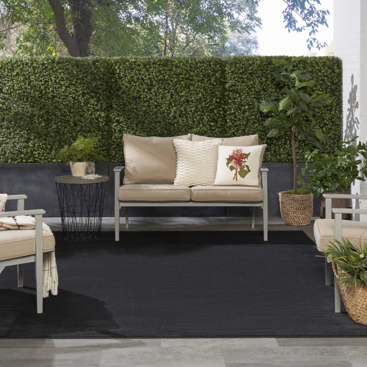 Mullican Sandy Solid Black Easy Care Indoor/Outdoor Area Rug