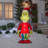 Airblown Grinch Holding String Of Stockings Inflatable