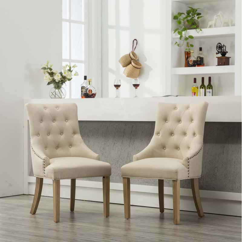 Fauteuils à oreilles capitonnés en bois massif capitonnés, Tanné