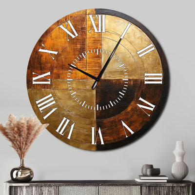 Horloge murale bronze à symétrie brillante - formes abstraites