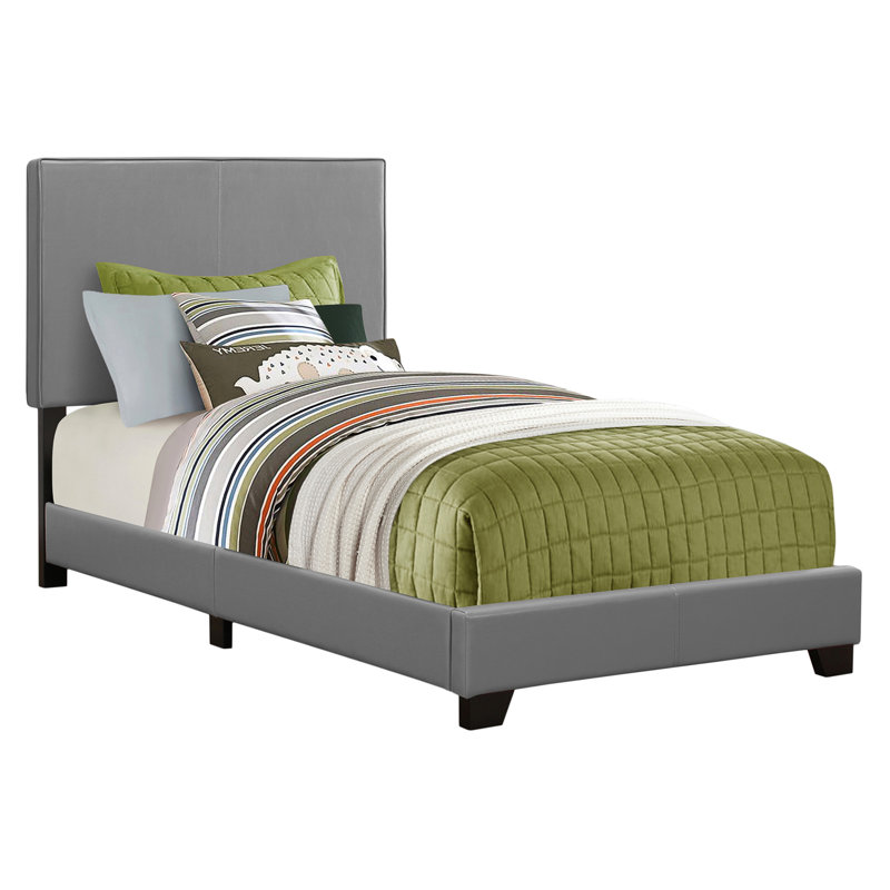Lit simple pour chambre à coucher avec une texture semblable à du cuir gris avec un aspect rembourré en cuir et un soutien pour les jambes stable